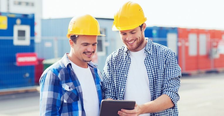 Builders using a tablet in the field v2